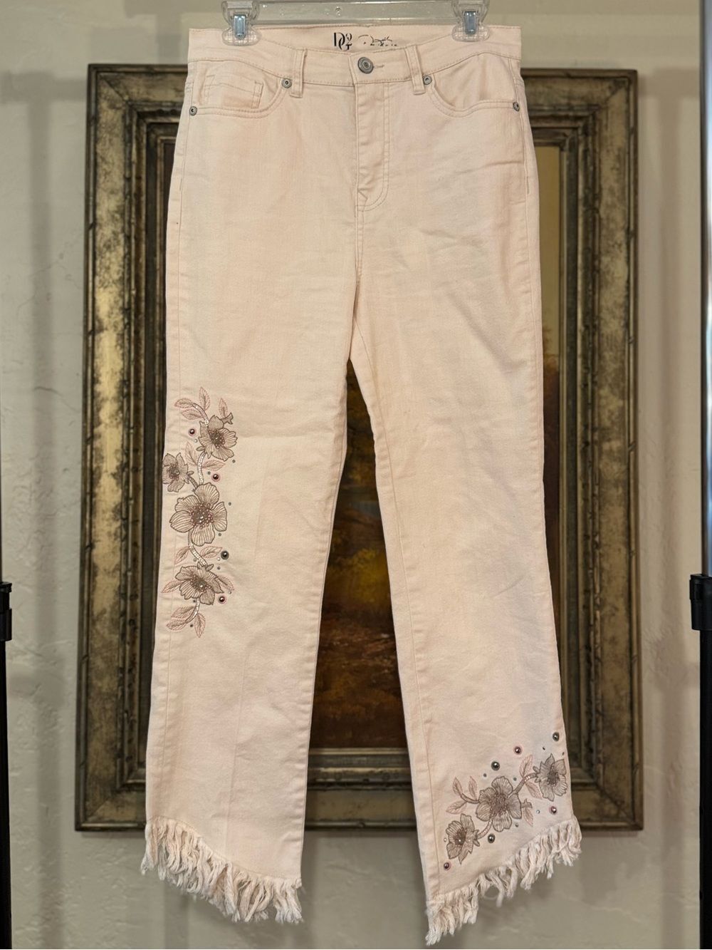 DG2 Diane Gilman off white embellished floral embroidered cropped fringed jeans.